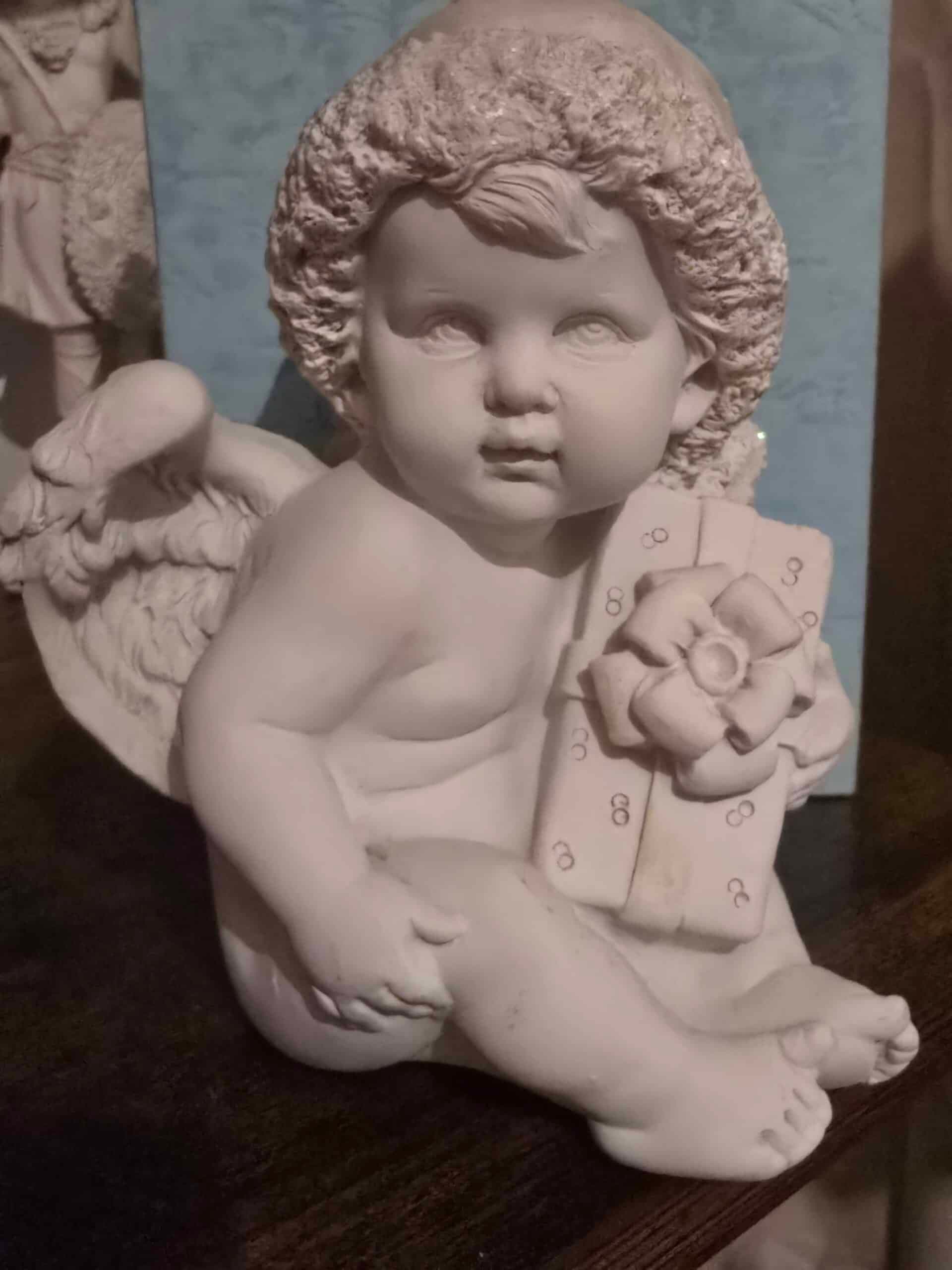 Statuette Ange Assis