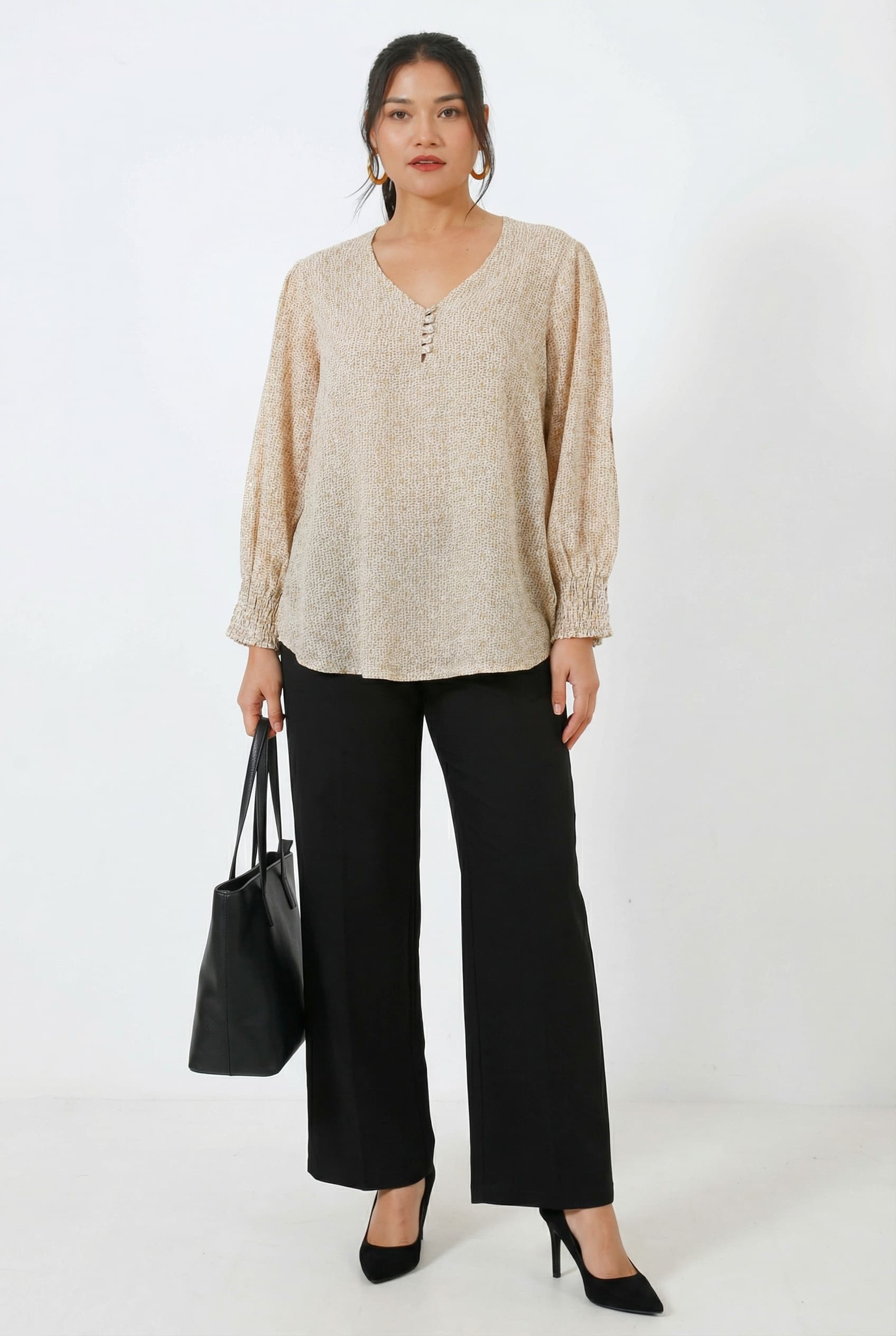 Blouse en voile imprimee serpent.