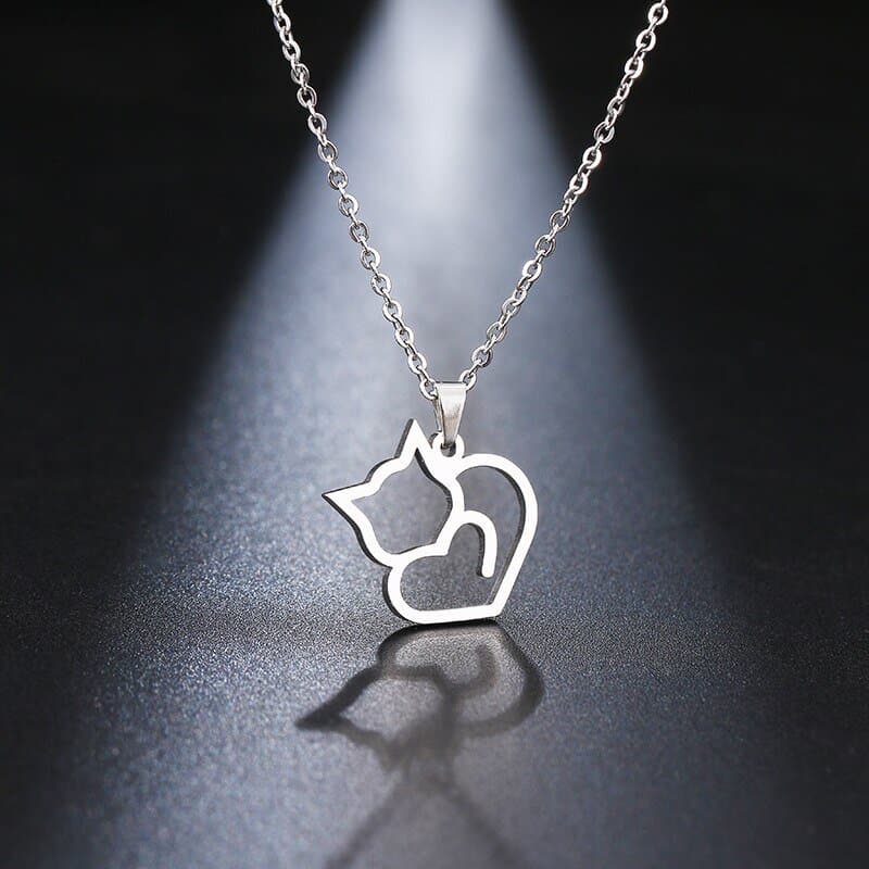 Pendentif chat fantaisie doré ou argenté - blanc