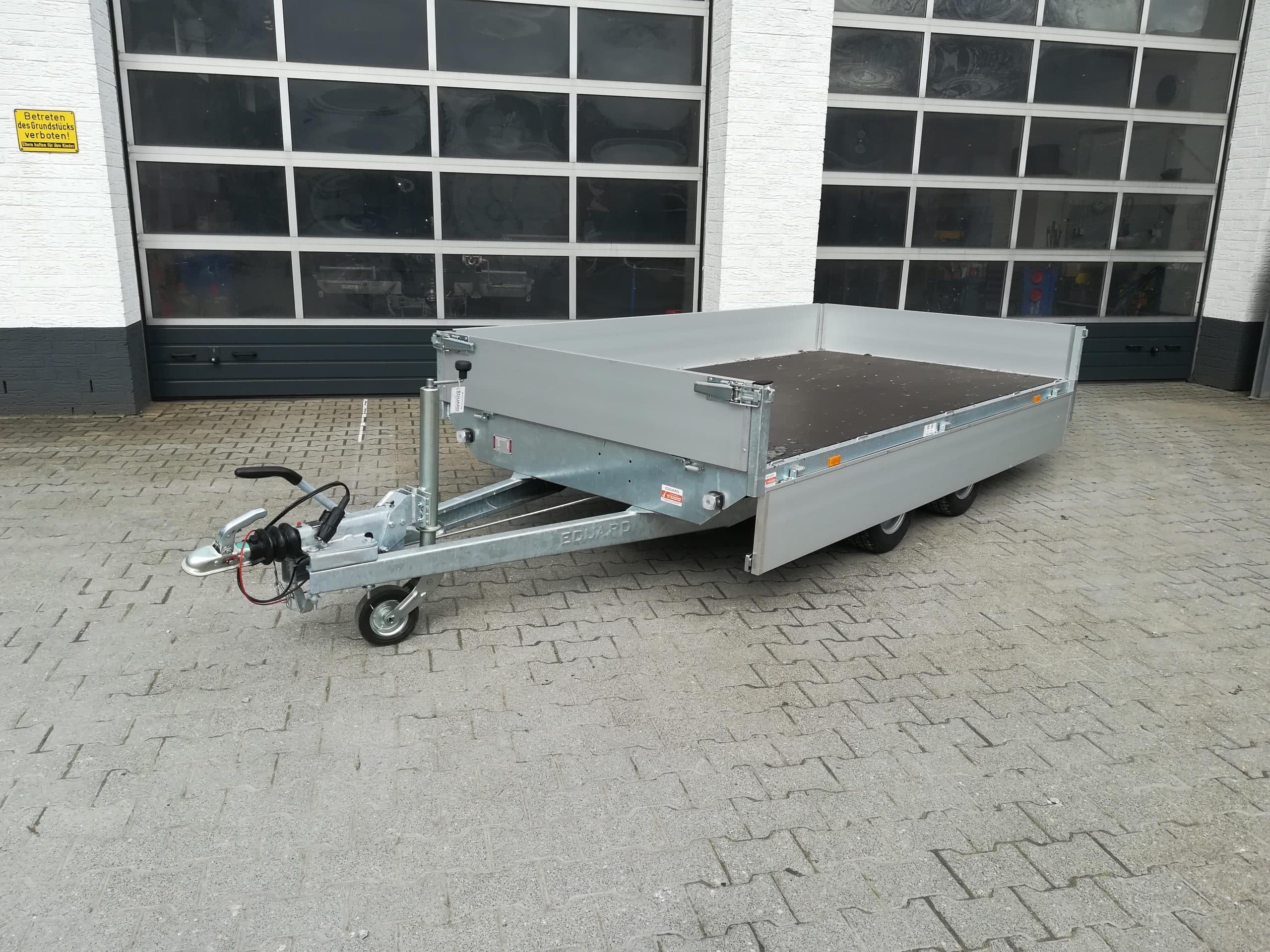 Rimorchio a pianale alto 310x160x30 cm, altezza di carico 56 cm, 10", telaio ribassato (M), 2000 kg