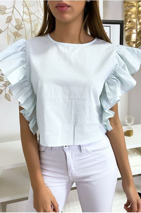 Blouse bleu très chic avec volant aux manches