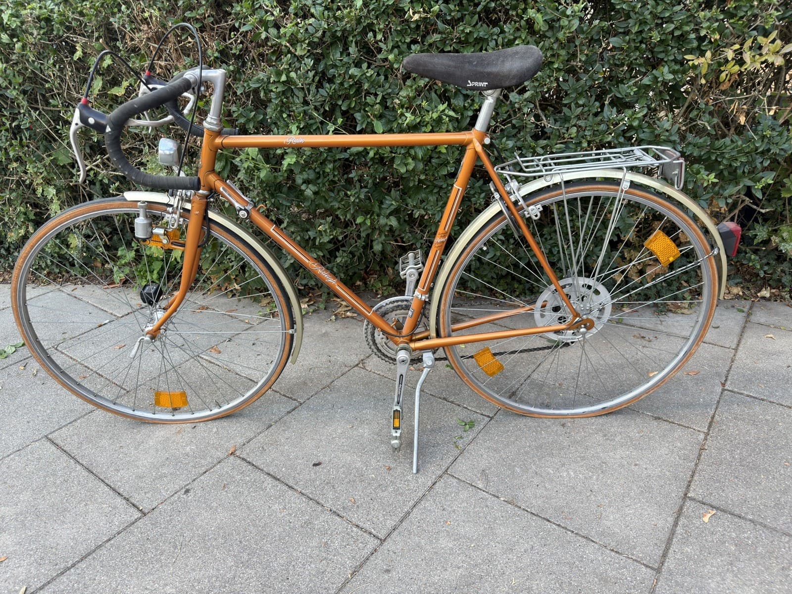 Herren-Sportrad Raleigh Rialto, orange-metallik, vintage Rennrad