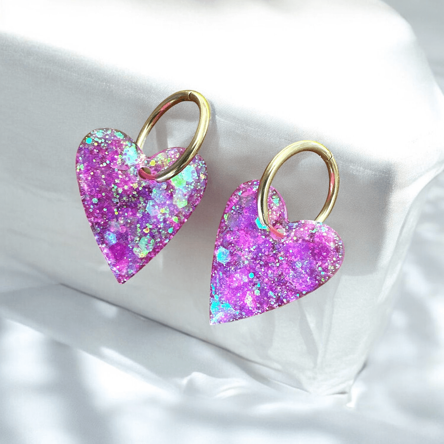 Boucles d'Oreilles maxi Cœur Scintillant rose en Résine