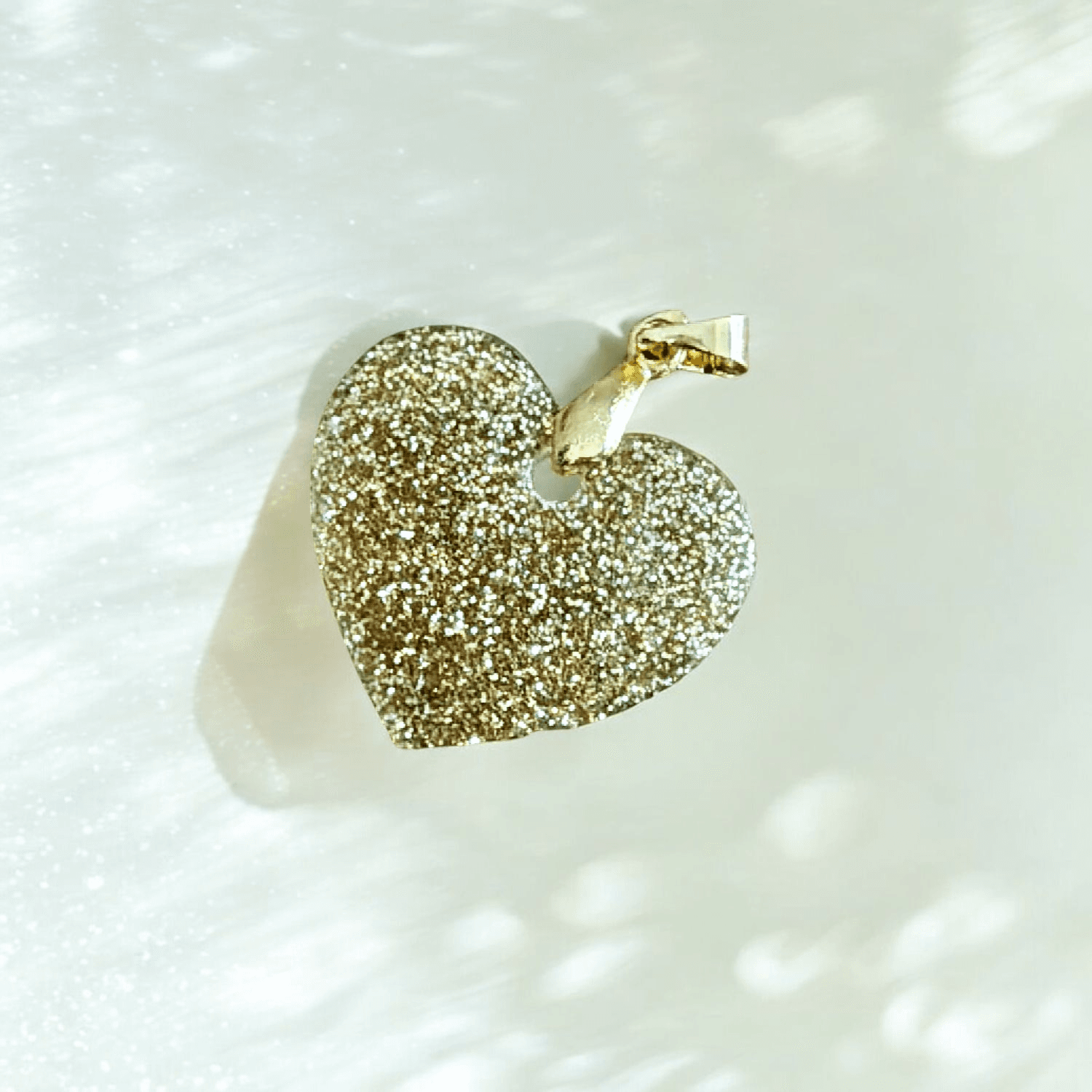 Collier cœur pailleté doré
