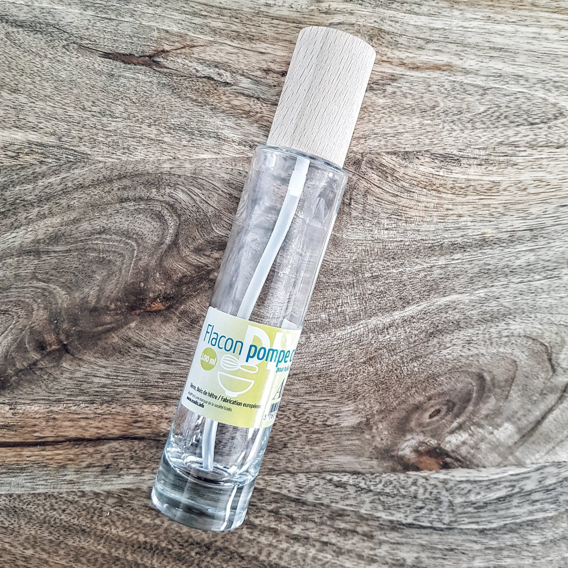 Flacon-pompe en verre + bouchon en hêtre 200ml