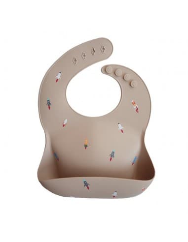 Bavoir souple en silicone Mushie Fusées Rocket Beige