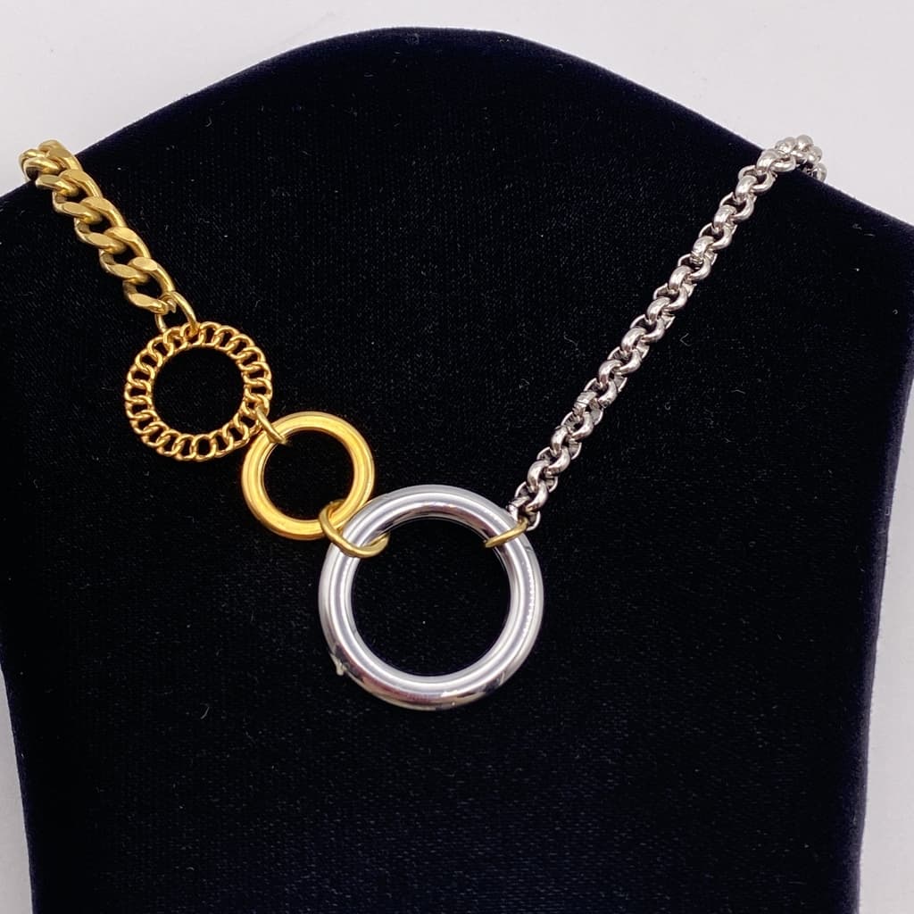 Collier multi-chaines gourmettes or et argent