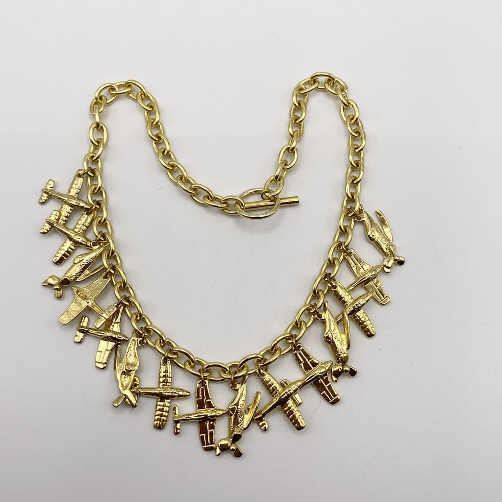 Collier doré à charmes avionnette