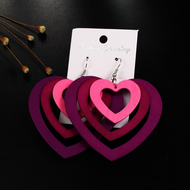 Boucles d'oreilles bois en forme de cœurs superposés Bleu