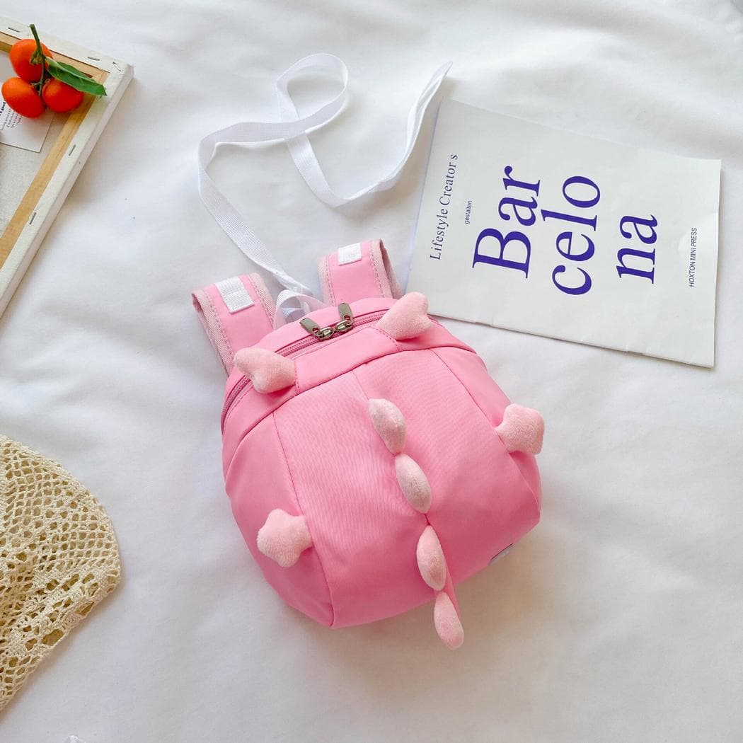 Sac à dos préscolaire forme dinosaure - rose
