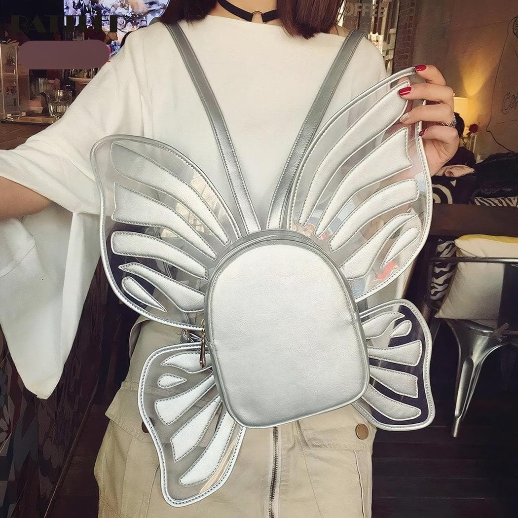 Sac à dos fille avec ailes de papillons - argente