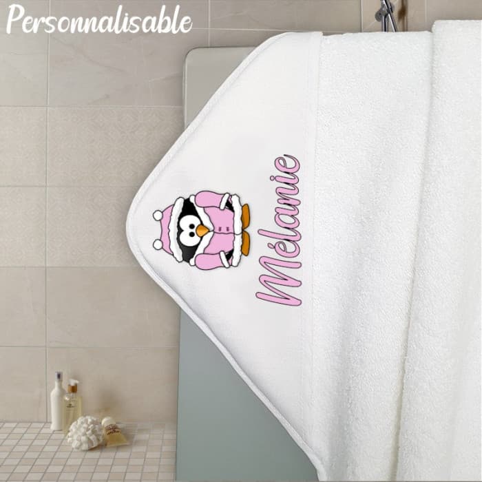 Cape de bain en éponge personnalisable modèle pingouin rose