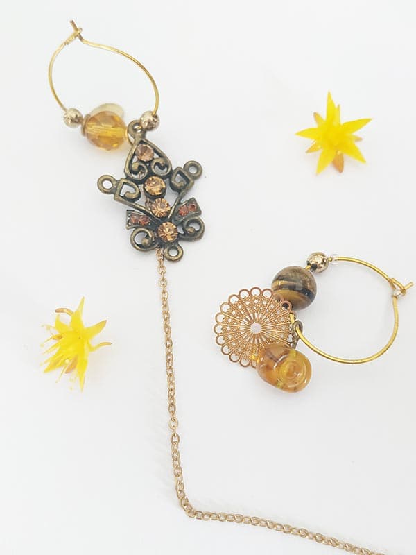 Boucles d'oreilles asymétriques vintage - Perle taureau VENDU