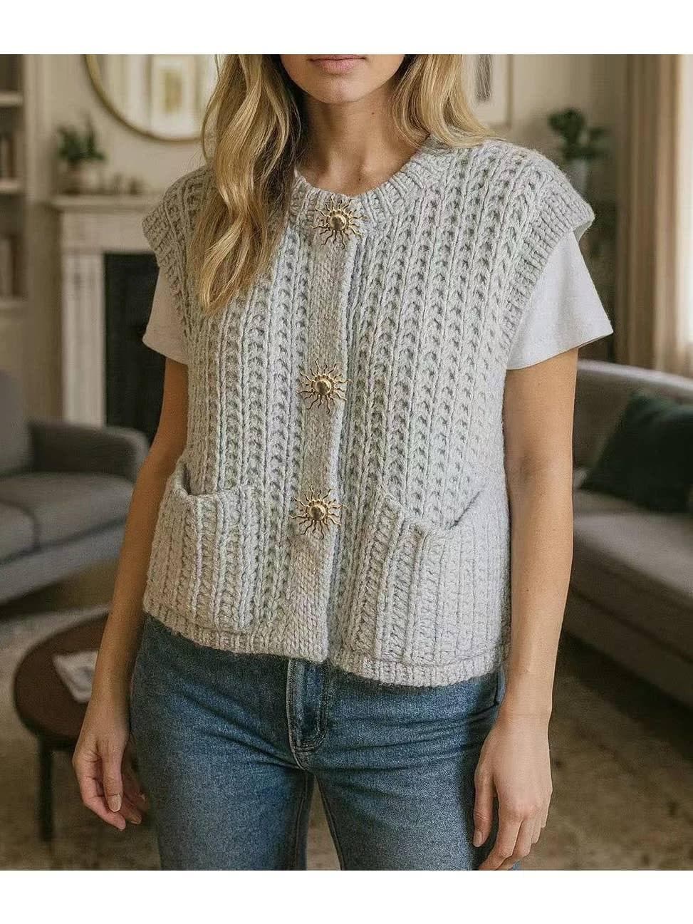 Pull en grosse maille avec broches soleil