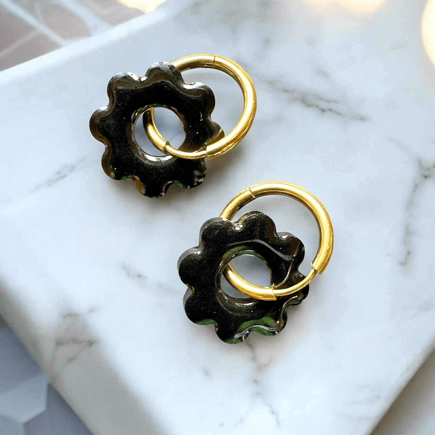 Boucles d'Oreilles soleil noir nacré