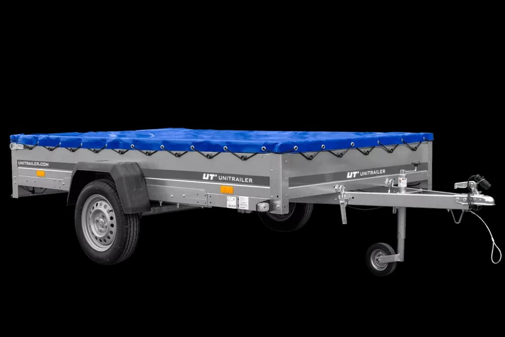 Einachsanhänger 264×150 UNITRAILER GARDEN 265 KIPP mit einem Flachplanenträger und blauer Plane