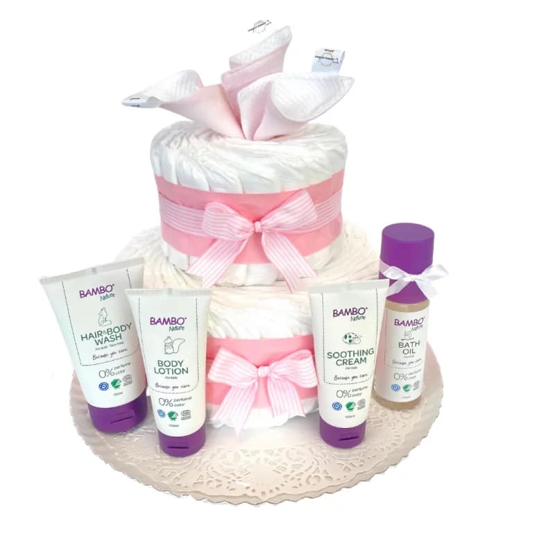 Gâteau de couches rose et ses soins de peau bio