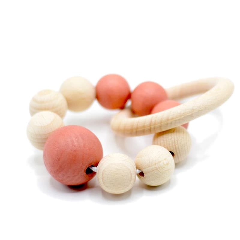 Hochet bracelet de perles de bois Rose avec anneau aPunt Barcelona®