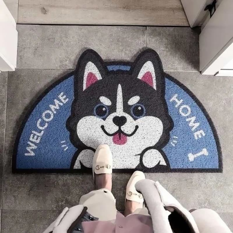 Paillasson en demi lune bleu avec un chien