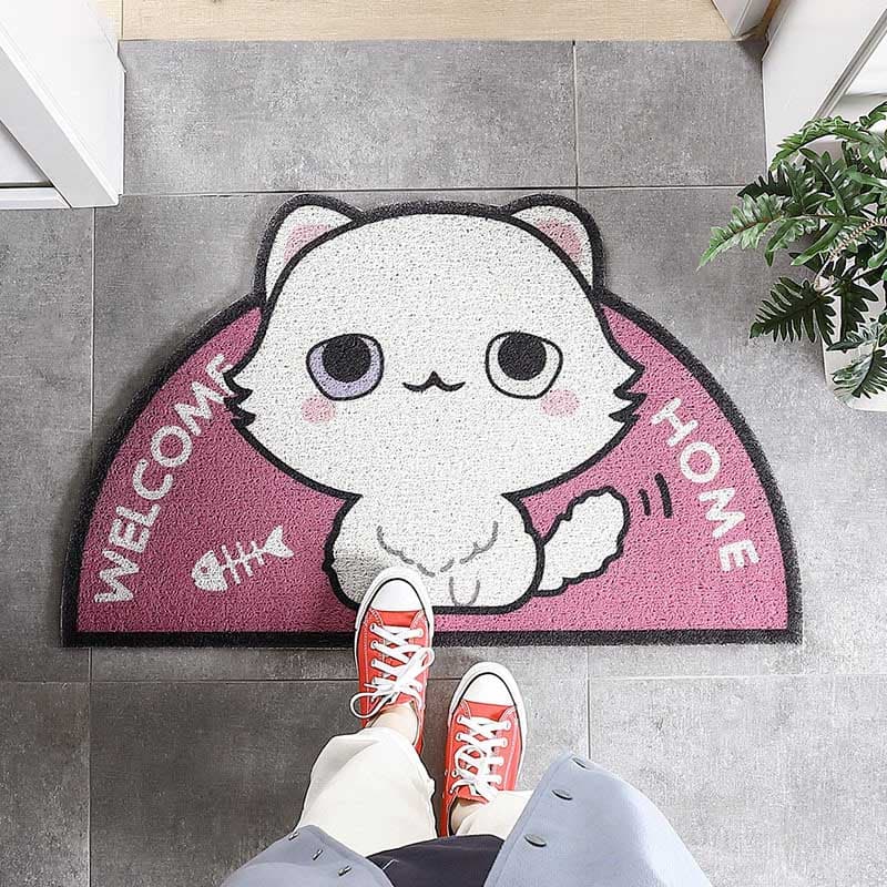 Paillasson en demi lune rose avec un chat
